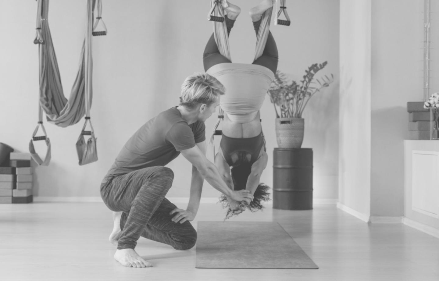 Gymnastics training session showing competitive floor routine preparation